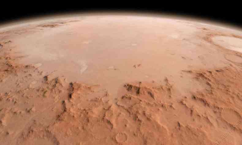 Os pesquisadores acreditam que as reas midas encontradas em Marte so gua em estado lquido(foto: Divulgao/Nasa)