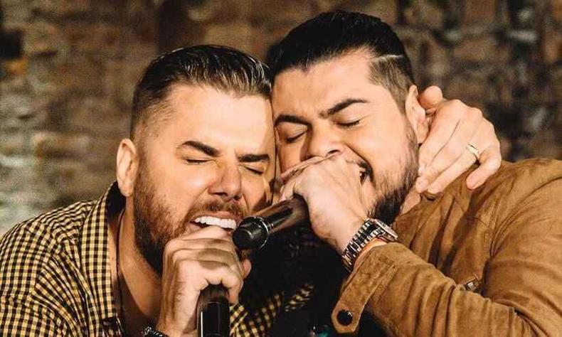 Apresentação foi cancelada após Zé Neto ser diagnosticado com sinusite(foto: Redes Sociais/Reprodução) Dupla sertaneja Zé Neto e Cristiano