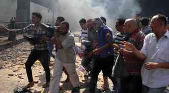 Dezenas de pessoas morreram em confrontos nesta sexta-feira(foto: AFP PHOTO / MAHMOUD KHALED )