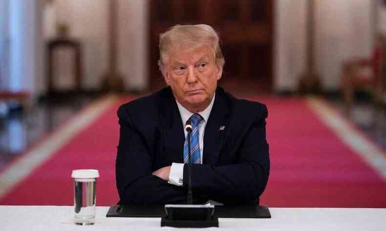 Presidente americano Donald Trump chamou processo de impeachment de 'caa s bruxas'(foto: Jim Watson/AFP)