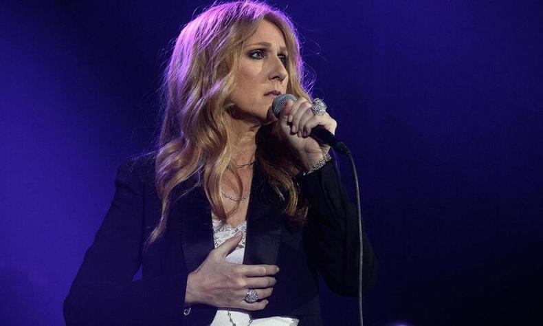 A cantora Celine Dion, de 54 anos, revelou ter que cancelar vários shows por sofrer de uma doença rara, a Síndrome da Pessoa Rígida(foto: PHILIPPE LOPEZ / AFP) Celine Dion