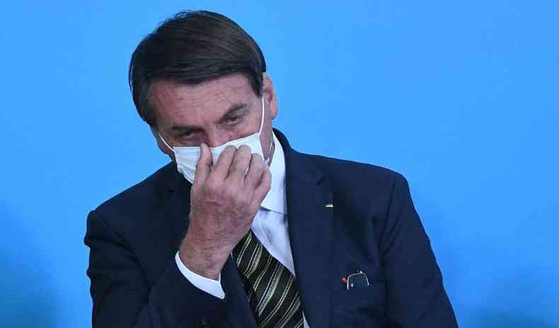 Presidente Jair Bolsonaro, de mscara