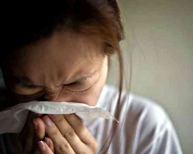 mulher com problemas respiratíorios