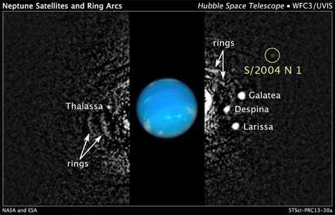 A recm-descoberta S/2004 N 1 orbitando o gigante Netuno(foto: AFP PHOTO / NASA/ESA )