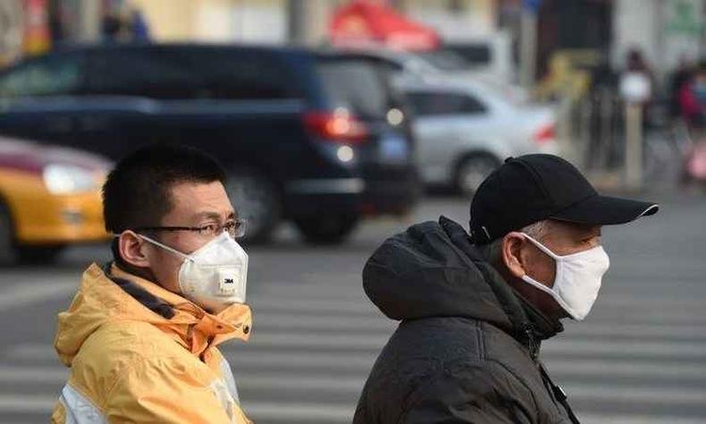 Chineses usam m�scaras para prote��o ao ar polu�do(foto: GREG BAKER / AFP)