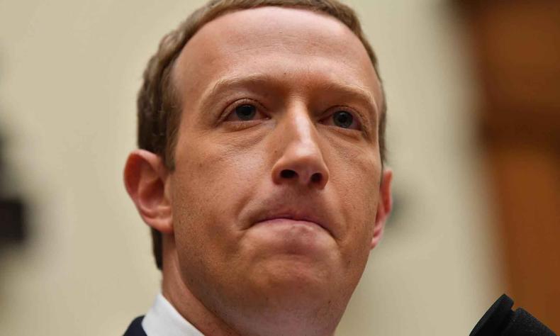 A empresa previu um crescimento mais lento e relatou a primeira queda no número de usuários diários do Facebook em nível mundial.(foto: Nicholas Kamm / AFP ) Mark Zuckerberg