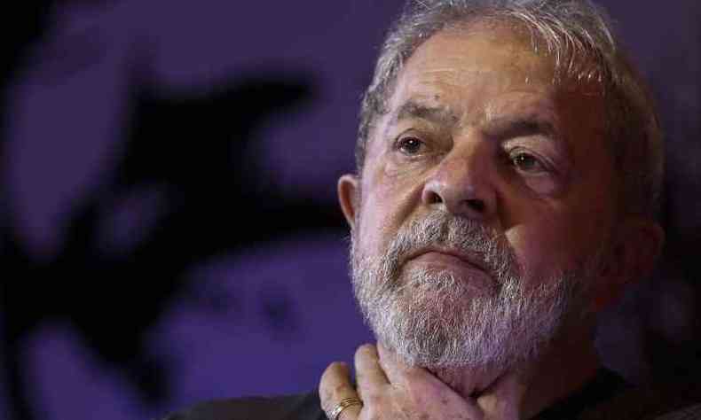 Lula  acusado nesse processode corrupo passiva e lavagem de dinheiro por ter sido supostamente beneficiado no esquema de cartel e corrupo da Petrobrs com o acerto de R$ 12,4 milhes em propinas da Odebrecht(foto: AFP / Miguel SCHINCARIOL )