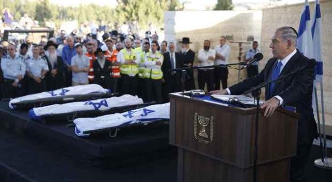 Primeiro ministro israelense Benjamin Netanyahu faz discurso em vel�rio dos tr�s adolescentes mortos na Cisjord�nia(foto: AFP PHOTO / POOL / BAZ RATNER)