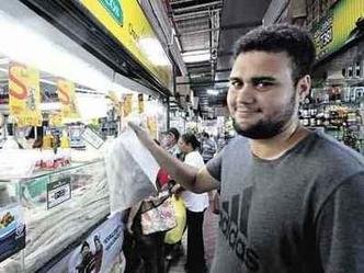 Sob protesto, Germano Freitas pagou R$ 94 pelo quilo de Bacalhau do Porto, em nome da tradi��o que a fam�lia quer manter(foto: Gladyston Rodrigues/EM/D.A Press)