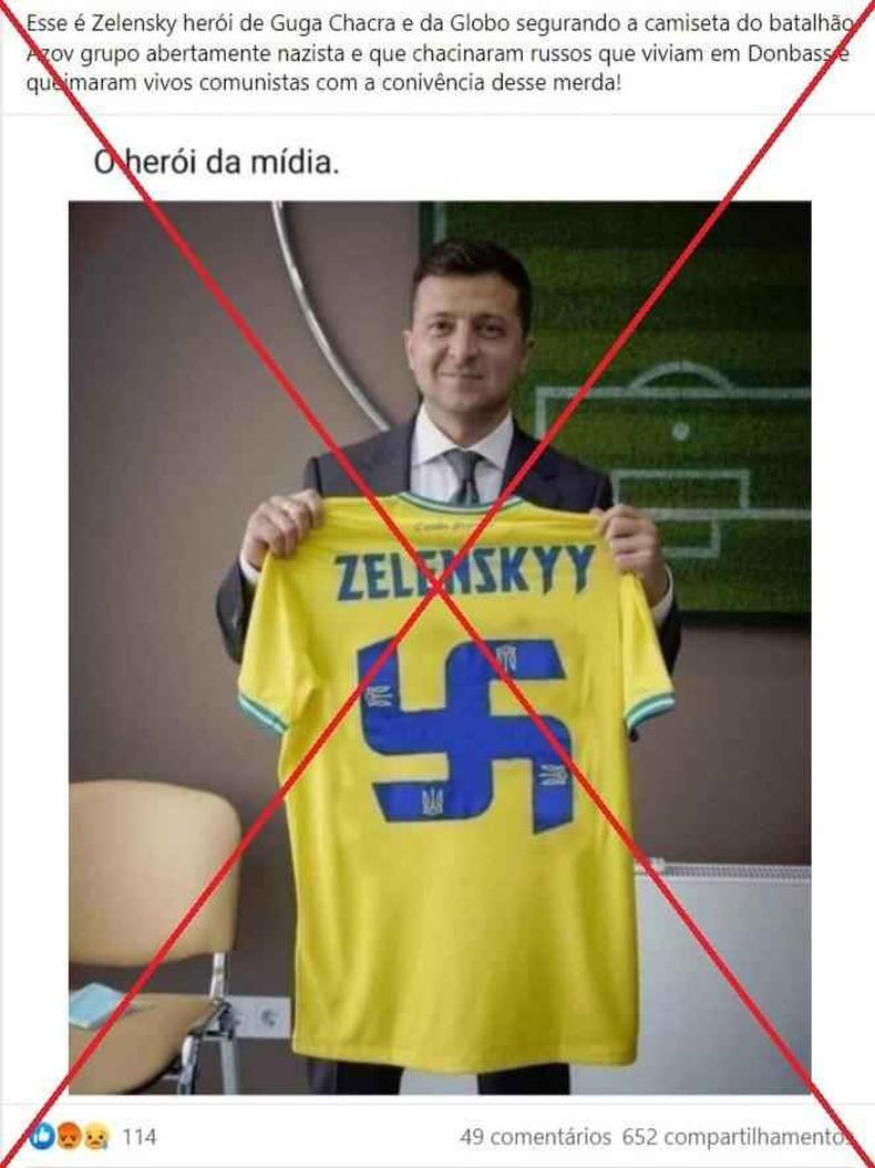 Captura de tela feita em 4 de março de 2022 de uma publicação no Facebook (foto: Reprodução Facebook) Presidente da Ucrânia segurando uma camisa com suástica nazista e um x vermelho alertando ser falsa