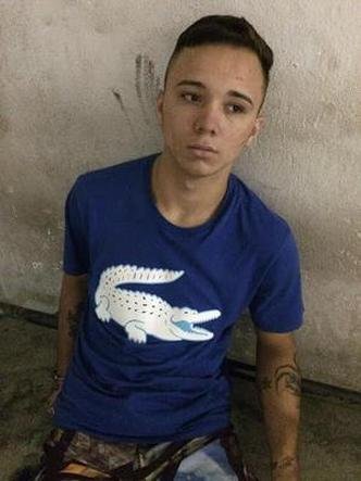 Segundo a PM, Lucas aparece nas imagens dando a arma para o menor atirar(foto: Divulgação/PMMG) Segundo a PM, Lucas aparece nas imagens dando a arma para o menor atirar(foto: Divulgação/PMMG)