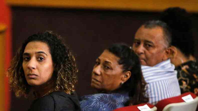 A irm de Marielle Anielle Franco ( esq.) e os pais Marinete e Antonio exigem Justia(foto: Daniel Ramalho/Getty Images)