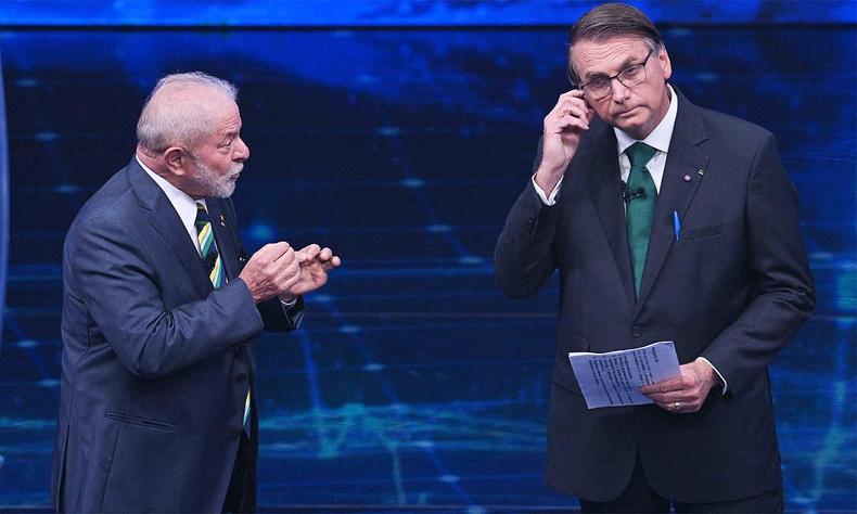 Lula e Bolsonaro durante debate da Band, em 16 de outubro