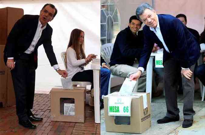 Candidato Oscar Ivan Zuluaga e presidente e candidato Juan Manuel Santosvotam em Bogot(foto: REUTERS/John Vizcaino / REUTERS/Jose Miguel Gomez )