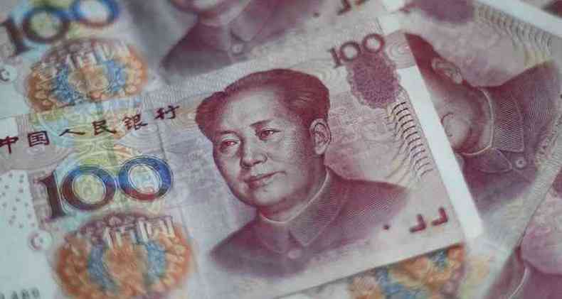 Cdulas de yuan, a moeda chinesa (foto: AFP PHOTO / FRED DUFOUR )