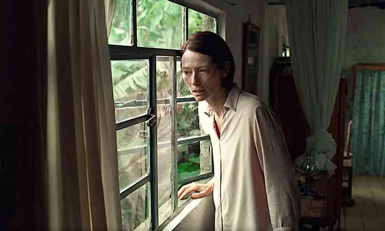 Actress Tilda Swinton looks out the window in a scene from the movie Mem
