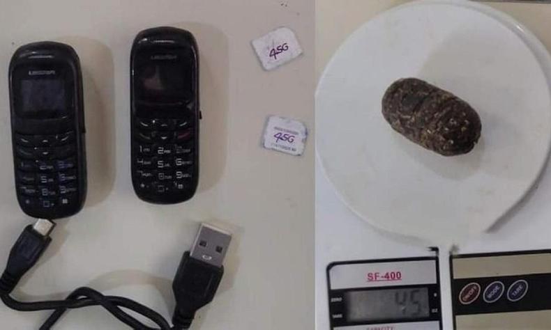 Foram descobertos dois celulares, um carregador e cerca de 45 gramas de maconha(foto: Divulgação/Polícia Penal) Dois celulares, um carregador e cerca de 45 gramas de maconha