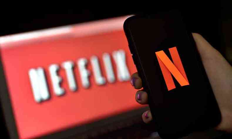 O ''N'' vermelho do logotipo da Netflix conquistou espaço na galeria de ícones visuais da cultura globalizada (foto: Olivier Douliery/AFP)