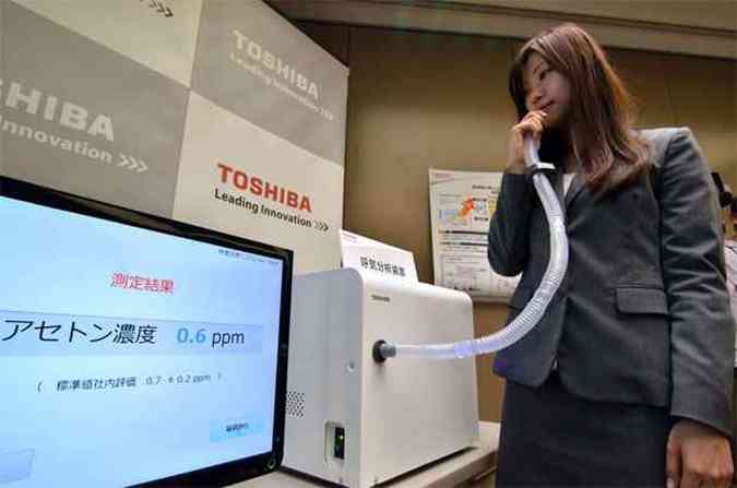 Expectativa da empresa  de que o aparelho seja comercializado em 2015(foto: AFP PHOTO / Yoshikazu TSUNO )