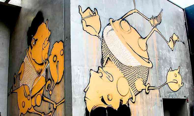 Grafite de Onesto Diesel mostra a figura de um lutador abatendo homem com coroa na cabea