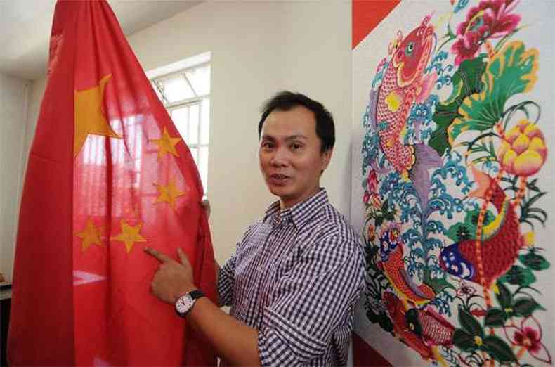 Li Zhenwen abriu uma escola de mandarim em BH: 