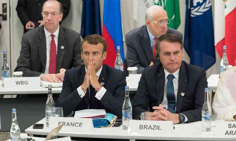 Presidentes Emmanuel Macron e Jair Bolsonaro(foto: Jacques Witt / POOL / AFP)
