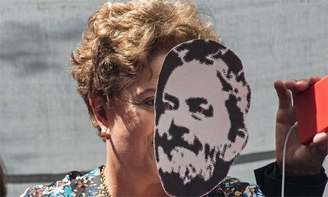 Dilma durante missa/comício no sábado (7), em frente à sede do Sindicato dos Metalúrgicos, São Bernardo do Campo (SP), onde Lula ficou entre a decretação de sua prisão e se entregar à Polícia Federal(foto: Nelson Almeida) Dilma durante missa/comício no sábado (7), em frente à sede do Sindicato dos Metalúrgicos, São Bernardo do Campo (SP), onde Lula ficou entre a decretação de sua prisão e se entregar à Polícia Federal(foto: Nelson Almeida)
