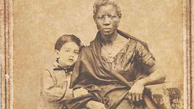 Augusto Gomes Leal com sua ama de leite Mnica, em fotografia de Joo Ferreira Villela, de 1860