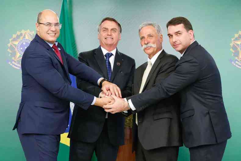 Governador Wilson Witzel, presidente Jair Bolsonaro, Chase Carey, Diretor Executivo da Frmula 1 e o senador Flvio Bolsonaro em junho de 2019(foto: Carolina Antunes/PR)