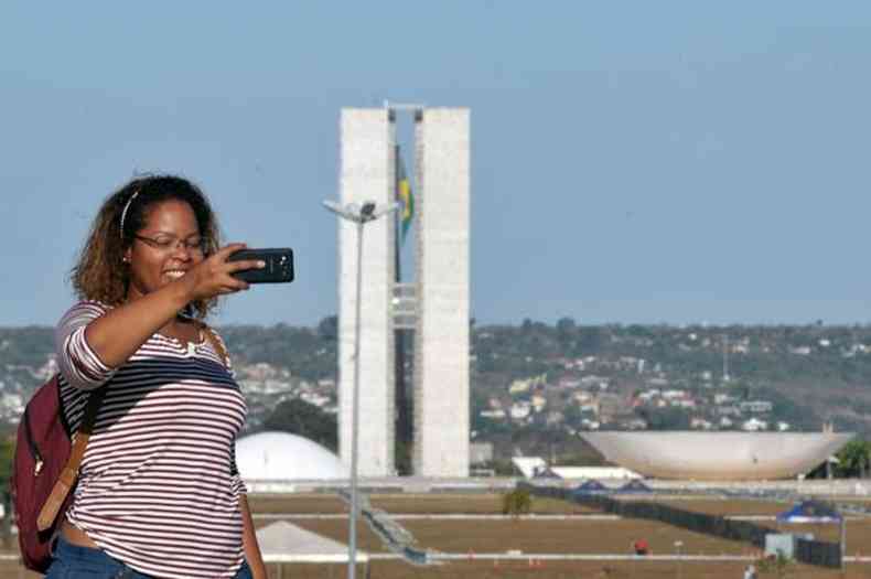 A estudante Las Braz nem sabia que Dilma estava ali no ponto turstico(foto: Antonio Cunha/CB/D.A Press)