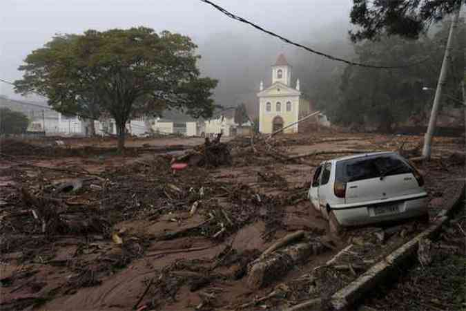 Tragdia de janeiro de 2011 ainda est recente na memria dos moradores(foto: AFP PHOTO / MAURICIO LIMA )