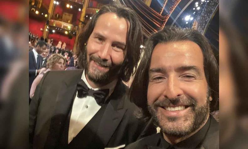 Ricardo Stuckert posa ao lado de Keanu Reeves