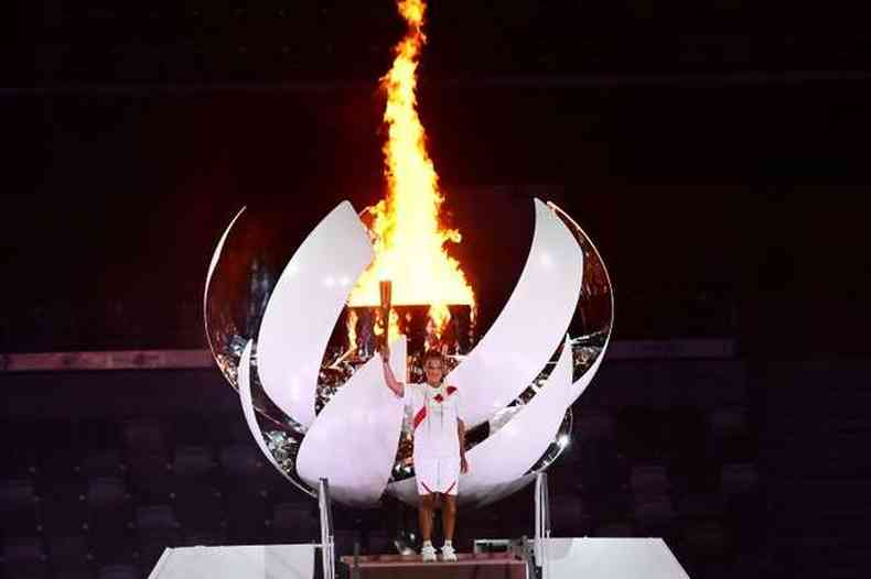 Tenista japonesa Naomi Osaka acendeu pira olmpica na abertura dos Jogos de Tquio(foto: FRANCK FIFE/AFP)