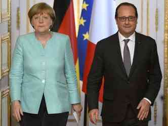 A chanceler alem, Angela Merkel, e o presidente da Frana, Franois Hollande, deixaram portas abertas (foto: AFP PHOTO / BERTRAND GUAY )
