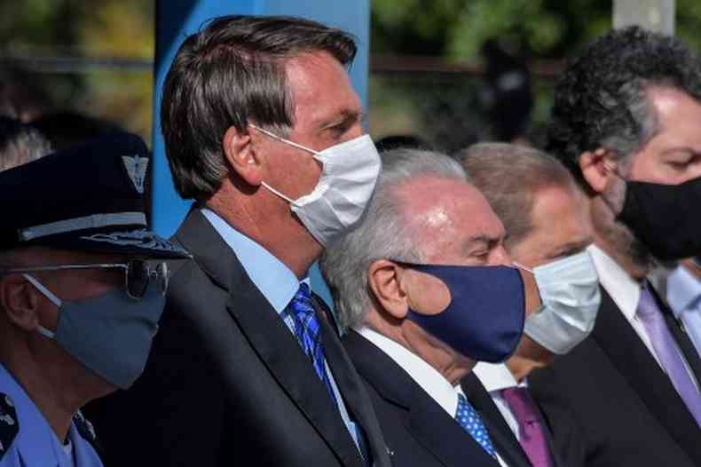 Presidente Jair Bolsonaro e seu antecessor, Michel Temer(foto: Nelson Almeida/AFP)