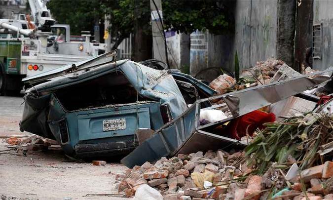 Rua na Zona Leste da Cidade do México ficou devastada após o tremor de terra(foto: AFP / ALFREDO ESTRELLA ) Rua na Zona Leste da Cidade do México ficou devastada após o tremor de terra(foto: AFP / ALFREDO ESTRELLA )