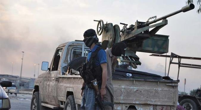 Homens do Estado Islâmico no Iraque e no Levante fazem patrulha em Mosul(foto: REUTERS/Stringer) Homens do Estado Islâmico no Iraque e no Levante fazem patrulha em Mosul(foto: REUTERS/Stringer)