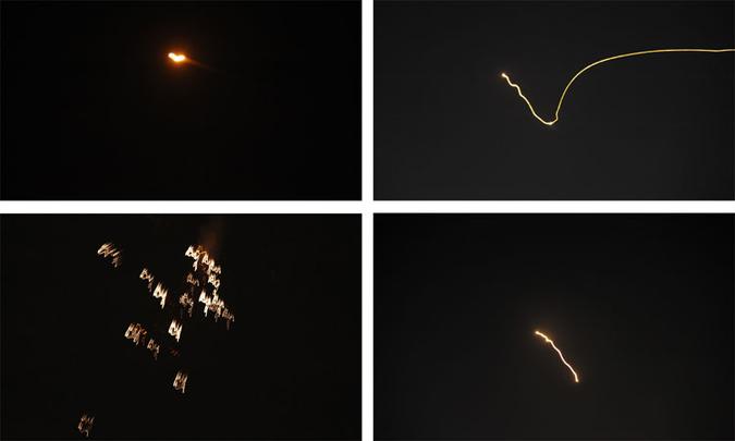 A TV estatal síria mostrou imagens 'ao vivo' de disparos iluminando o céu de Damasco e de vários mísseis destruídos pelos sistemas antiaéreos (foto: AFP PHOTO / SANA) A TV estatal síria mostrou imagens 'ao vivo' de disparos iluminando o céu de Damasco e de vários mísseis destruídos pelos sistemas antiaéreos (foto: AFP PHOTO / SANA)