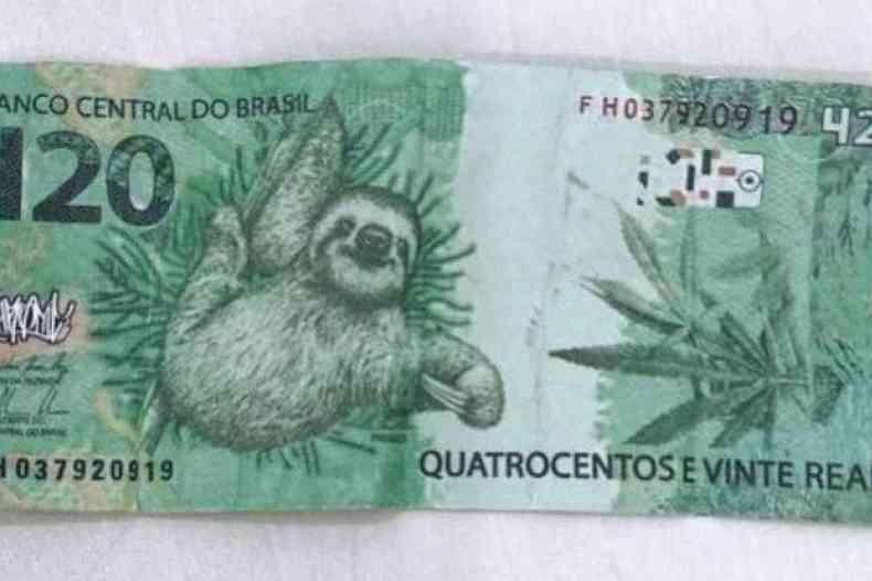 Imagem da nota de R$ 420 com estampa de maconha e bicho-preguia