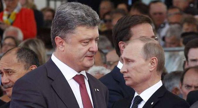 Presidentes Poroshenko e Putin em encontro na Normandia em 6 de junho(foto: CHRISTOPHE ENA/AFP) Presidentes Poroshenko e Putin em encontro na Normandia em 6 de junho(foto: CHRISTOPHE ENA/AFP)