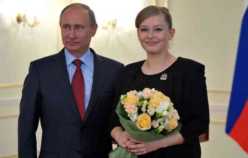 Atriz Yuliya Peresild, ao lado do presidente russo Vladimir Putin, ir para o espao(foto: AFP PHOTO / RIA-NOVOSTI POOL/ ALEXEI NIKOLSKY)