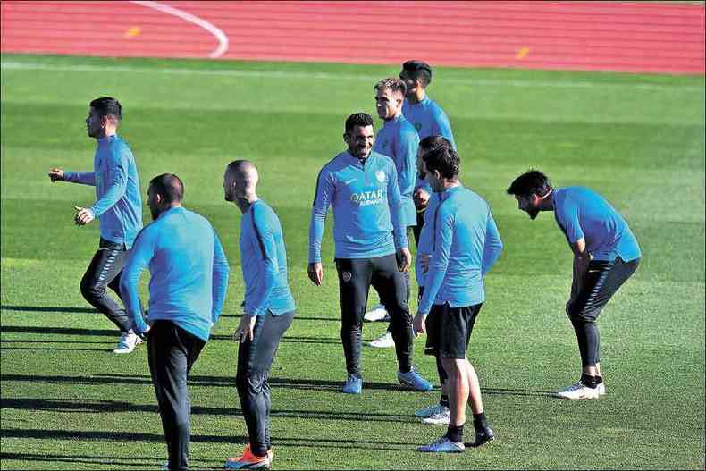 Tvez e seus companheiros de Boca treinaram ontem nas instalaes da federao espanhola, nos arredores de Madri(foto: GABRIEL BOUYS/AFP)