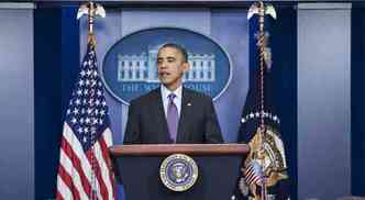 Barack Obama fez pronunciamento oficial lamentando a morte de Madiba(foto: BRENDAN SMIALOWSKI / AFP)