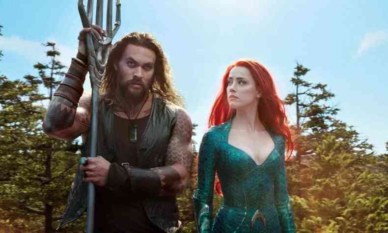 Atores Jason Momoa e Amber Heard em cena do filme Aquaman