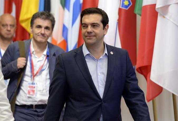 'O Grexit  coisa do passado', festejou Tsipras, depois da maratona de negociaes, iniciada h quase seis meses(foto: AFP PHOTO / THIERRY CHARLIER )