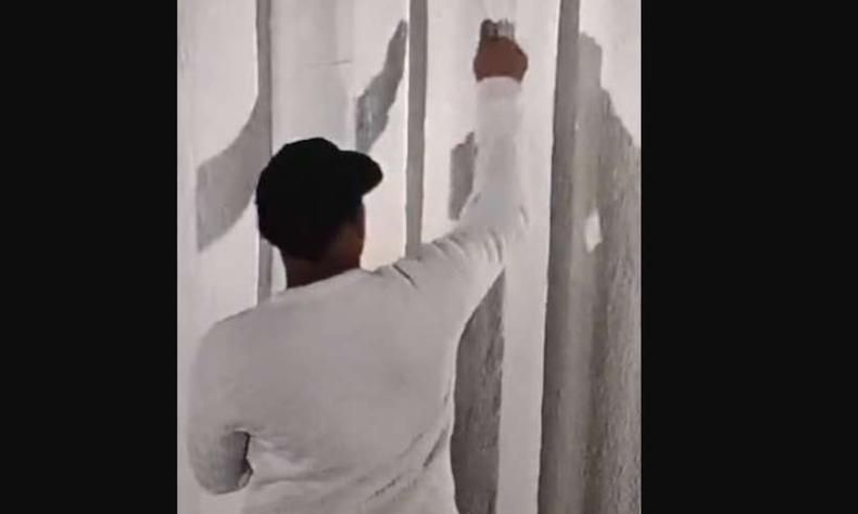 Homem foi flagrado pichando esttua de Cristo Redentor em BH