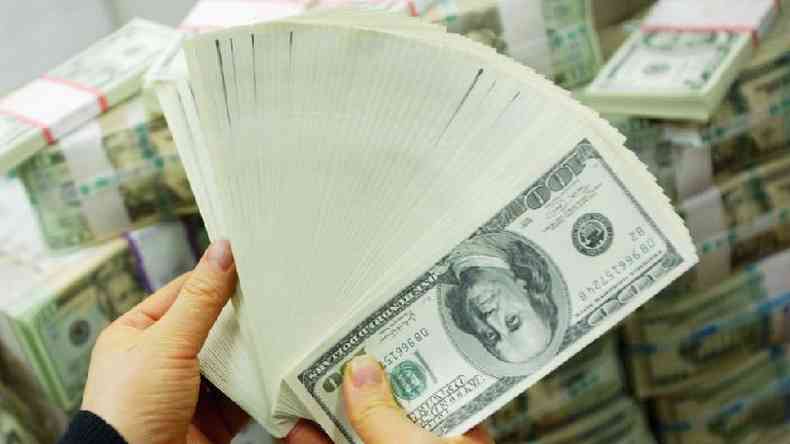 Banco Central dos EUA deu sinal verde para emisso de dinheiro e inundou mundo com dlares(foto: Getty Images)