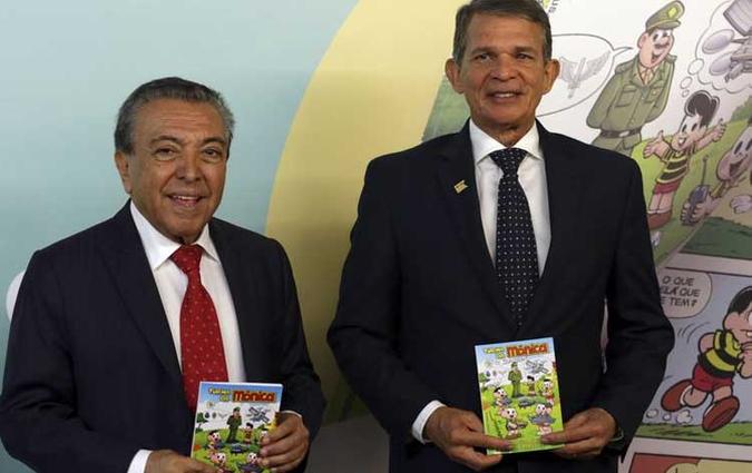 O Ministro da Defesa, Joaquim Silva e Luna, e o escritor Mauricio de Souza durante o lançamento do almanaque A Turma da Mônica e a Indústria de Defesa(foto: Antonio Cruz/Agência Brasil) O Ministro da Defesa, Joaquim Silva e Luna, e o escritor Mauricio de Souza durante o lançamento do almanaque A Turma da Mônica e a Indústria de Defesa(foto: Antonio Cruz/Agência Brasil)
