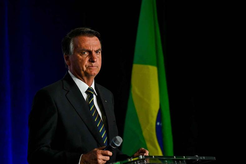Ex-presidente Jair Bolsonaro (PL) diz que deve voltar ao Brasil para liderar a direita(foto: CHANDAN KHANNA / AFP) Jair Bolsonaro (PL)