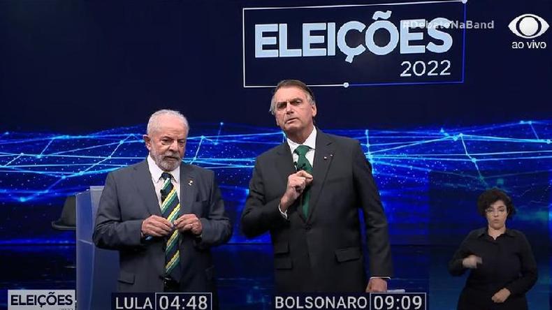 Lula e Bolsonaro durante debate na Band